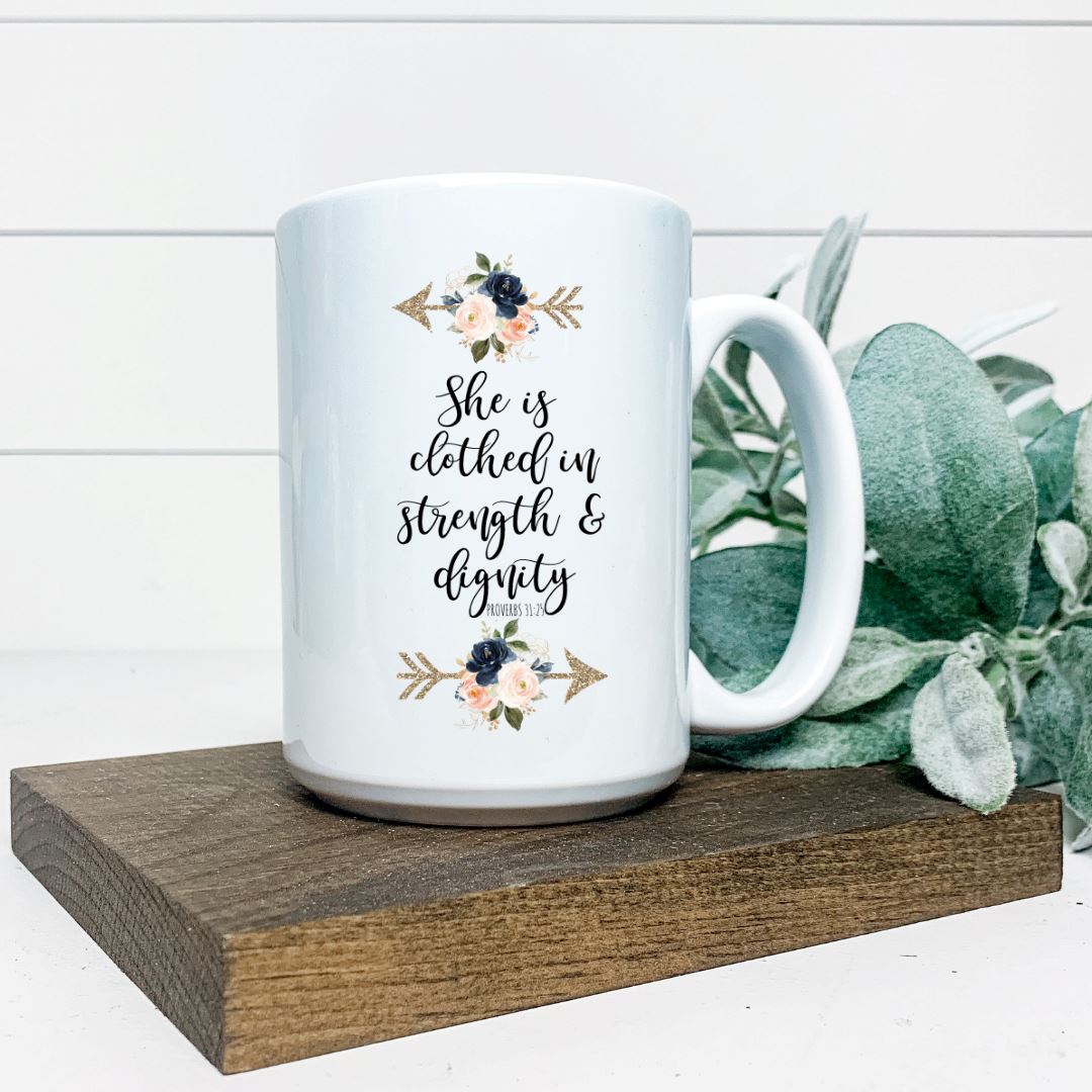 SHE IS CLOTHED IN STRENGTH AND DIGNITY MUG Harlow Boutique Official Online Store