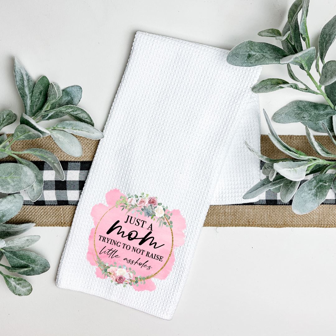 JUST A MOM TRYING NOT TO RAISE LITTLE ASSHOLES TEA TOWEL Harlow Boutique Official Online Store