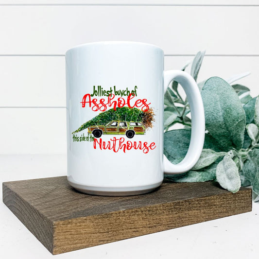 JOLLIEST BUNCH OF ASSHOLES THIS SIDE OF THE NUTHOUSE MUG Harlow Boutique Official Online Store 