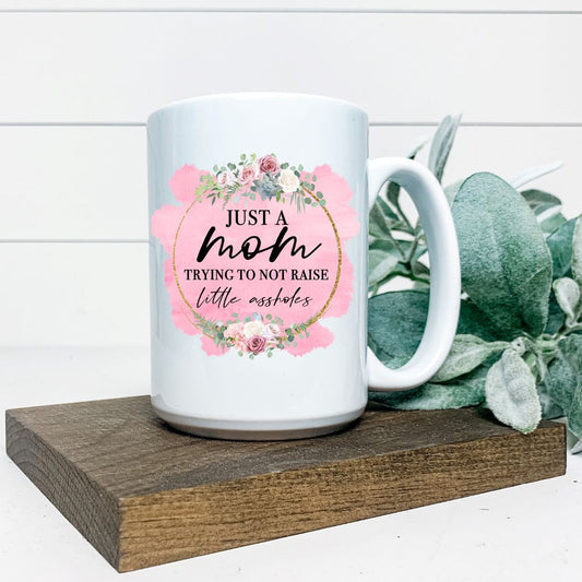 JUST A MOM TRYING NOT TO RAISE LITTLE ASSHOLES MUG Harlow Boutique Official Online Store 